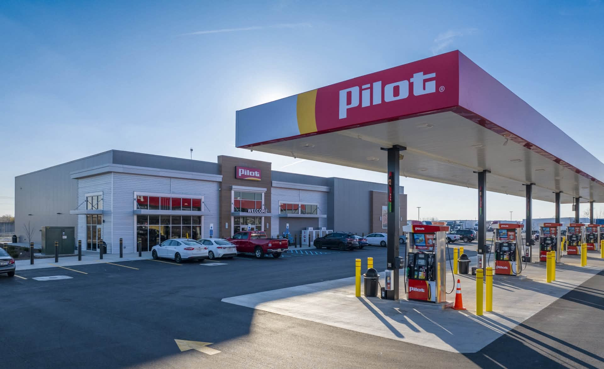 Travel center with rebuilt canopy, pumps, and storefront